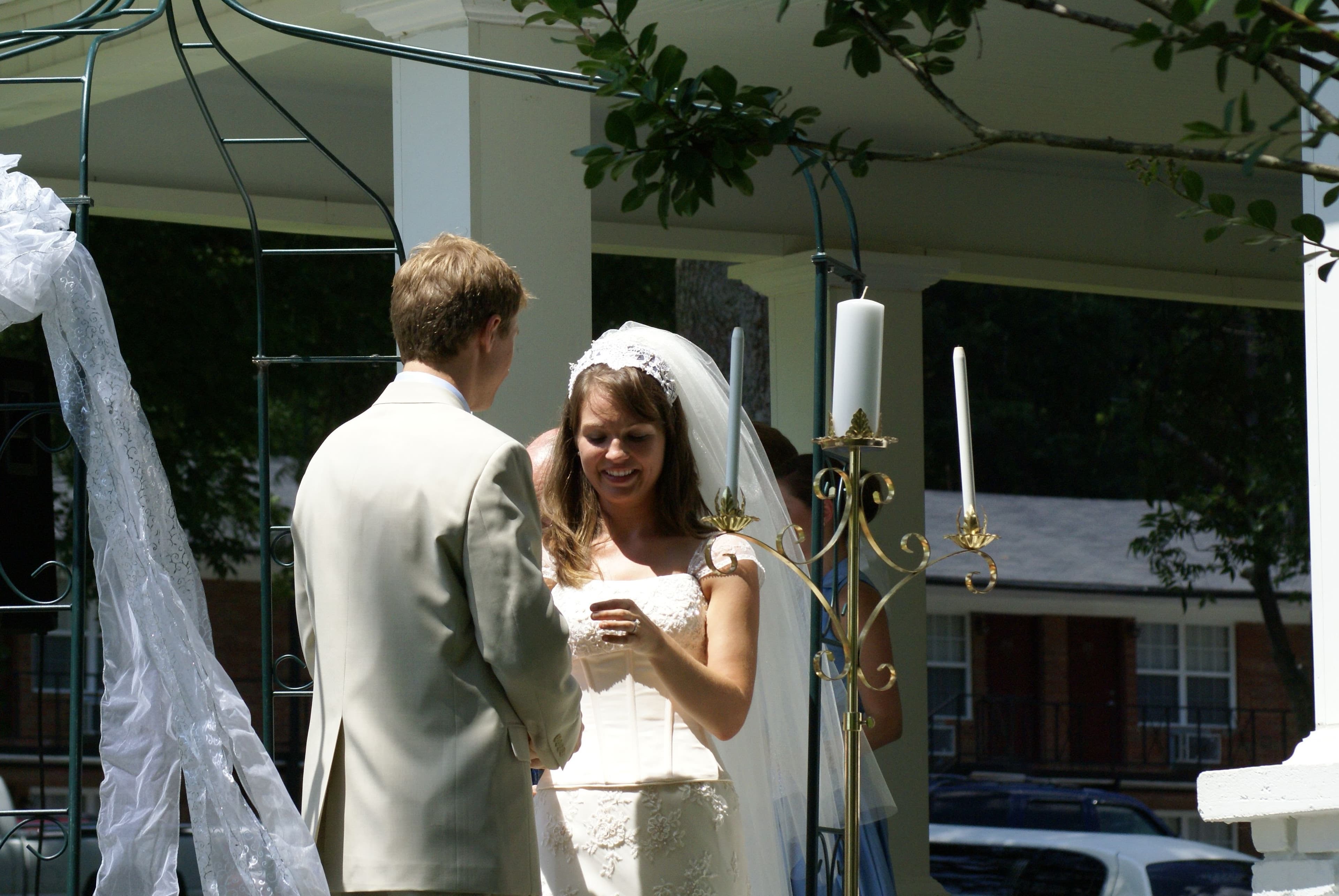 Couple exchanging vows at the JSU Alumni House